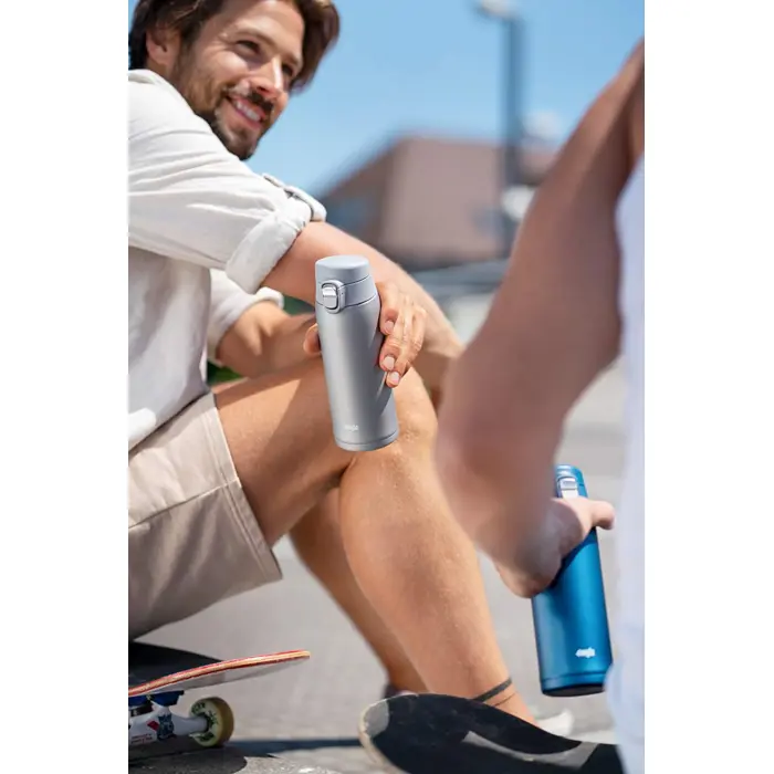 emsa-travel-mug-light-thermal-mug-04-liters-dark-blue-flip-l-26442-n2150900-w.webp